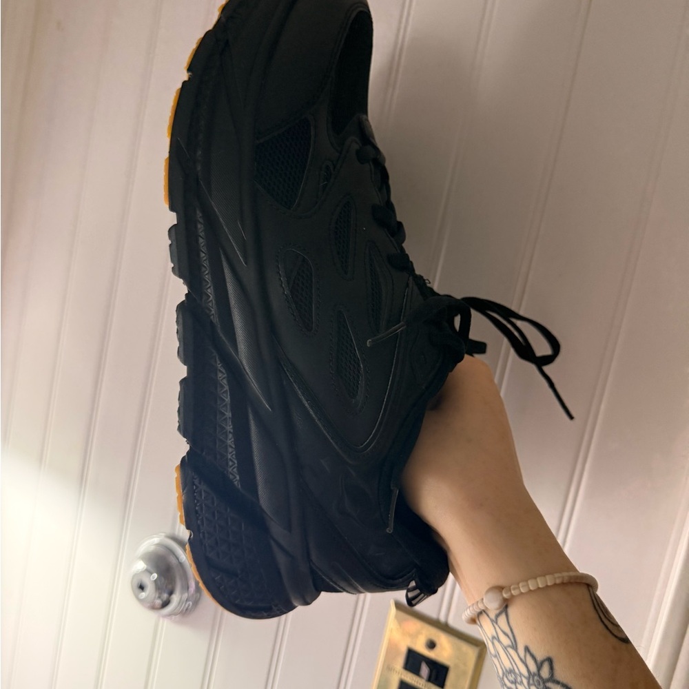 Hoka Black Athletic Sneaker with Yellow Outsole Accents